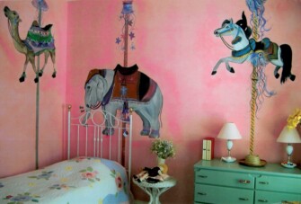 pink carousel in child bedroom